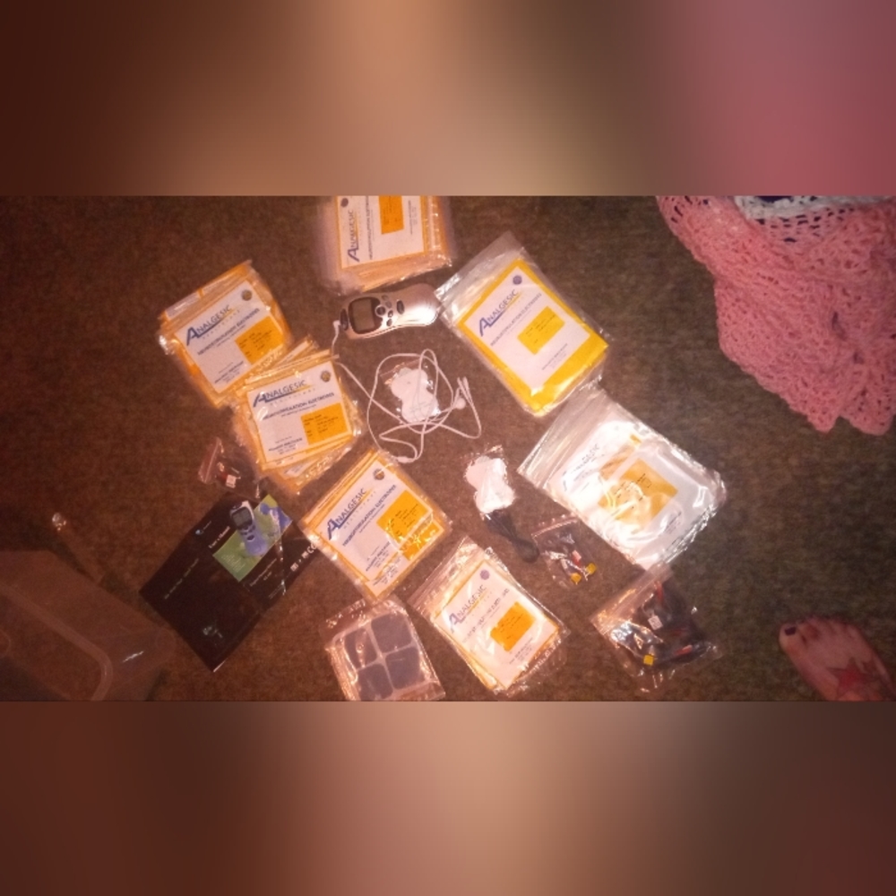 TENS unit w electrodes various sizes bulk